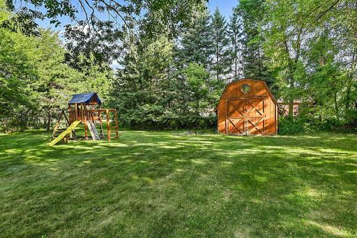 Situated on a spacious .55-acre lot in the heart of St. Stephen, this home offers a great backyard with mature trees and a convenient storage shed.