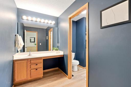 Featured here is the dual-ensuite with the split vanity for the primary bedroom.