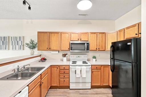 The heart of the home is anchored by an incredible amount of cabinetry and a dedicated pantry, allowing you to keep your counters clutter-free.