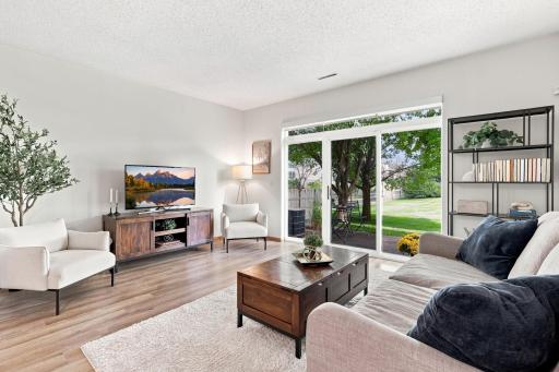 These gorgeous patio doors, equipped with custom blinds, pull the beauty of the outdoors into the home.