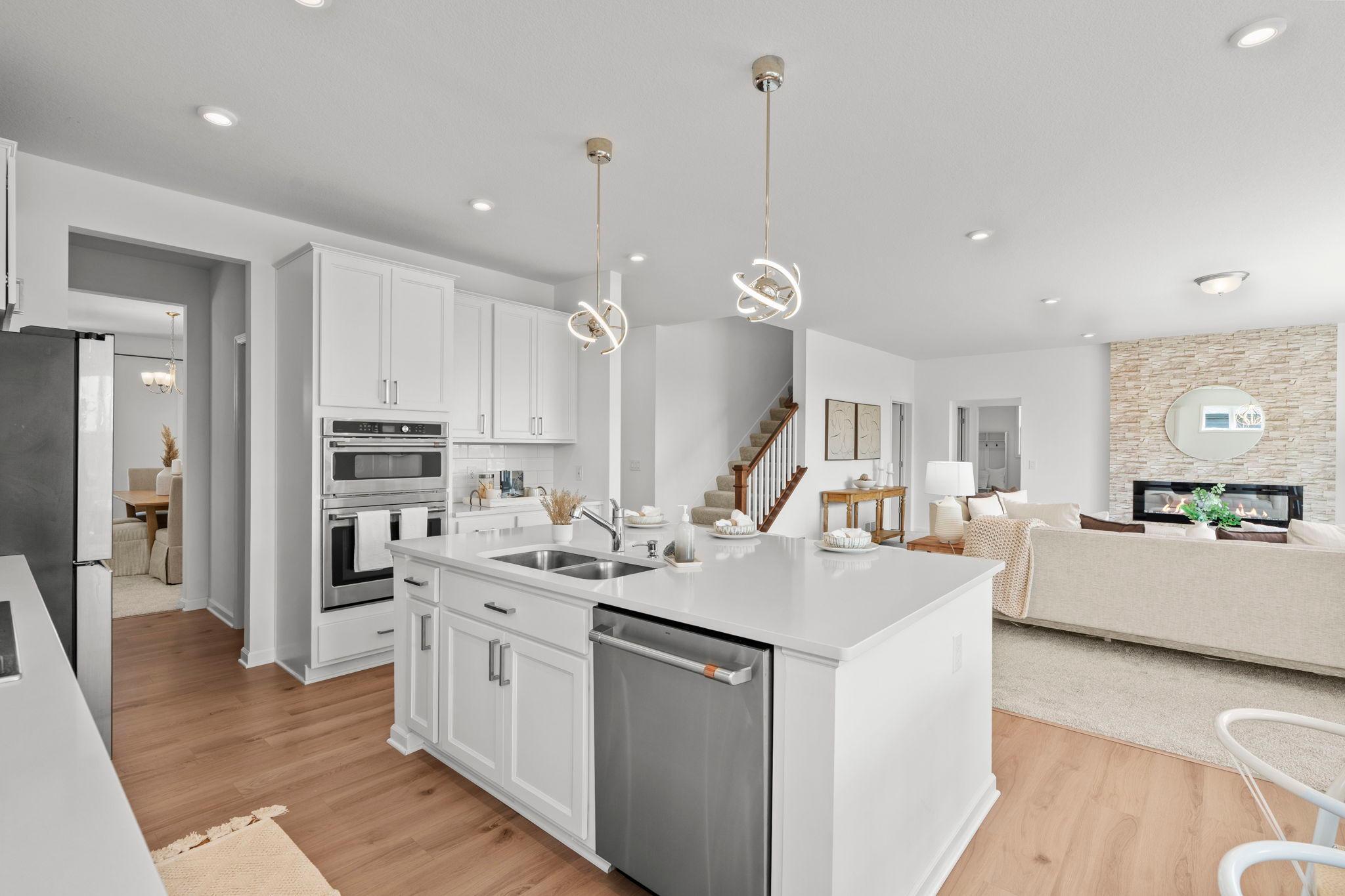 Open-concept design that creates effortless flow, bright sightlines, and a modern, spacious feel throughout the home.