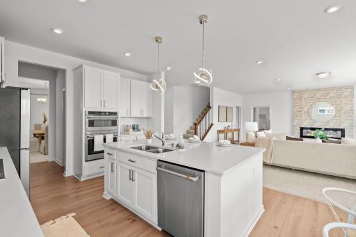 Open-concept design that creates effortless flow, bright sightlines, and a modern, spacious feel throughout the home.