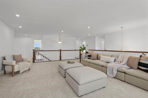 Spacious loft filled with natural light, offering a versatile open area perfect for work, play, or relaxation.