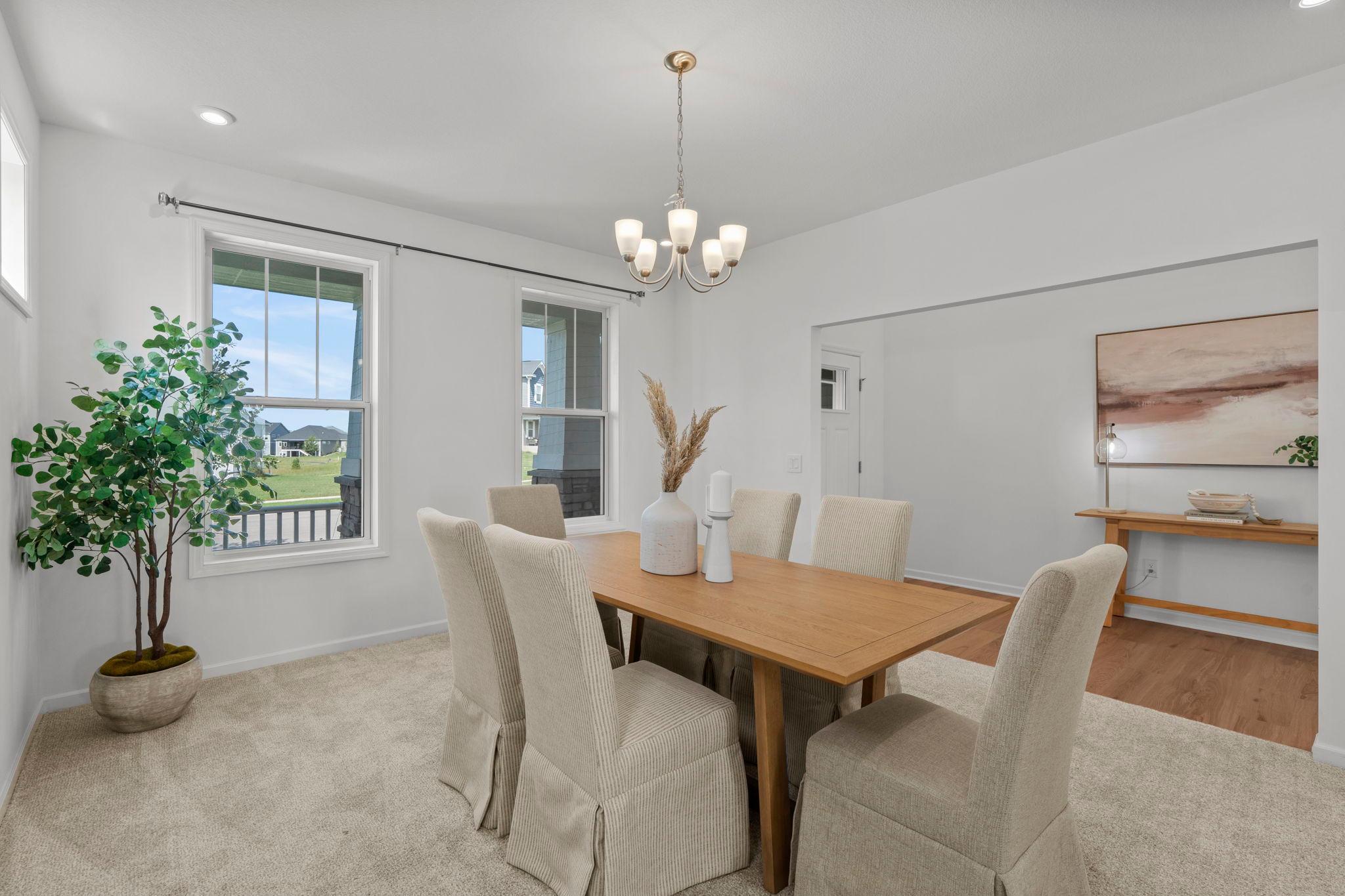The home features a beautiful formal dining room designed for both everyday meals and special gatherings.