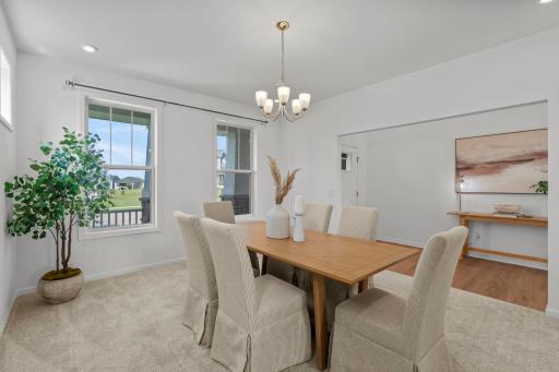 The home features a beautiful formal dining room designed for both everyday meals and special gatherings.