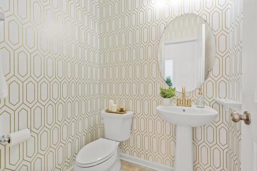 Beautiful main-level bathroom featuring modern finishes, fresh updates, and convenient access for guests and everyday living.