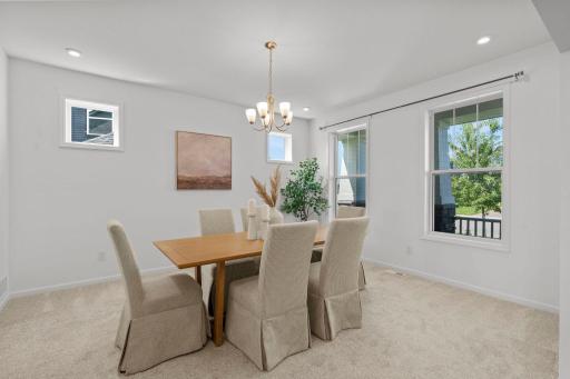 This inviting space flows seamlessly from the foyer and main living areas, creating the perfect setting for hosting holidays, dinner parties, or intimate celebrations.