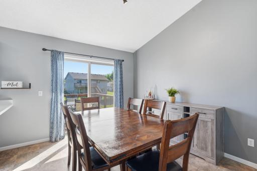 Dining room has a patio door that leads to the deck