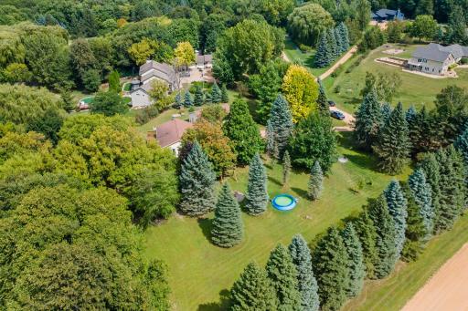 Mature trees surround home giving privacy and nature