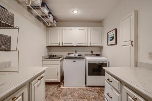 33 MainLvl Laundry Heated Tile Floors and Marble Counters.jpg