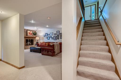 25b Lwr Lvl Family Room and Wood Burning Fireplace.jpg
