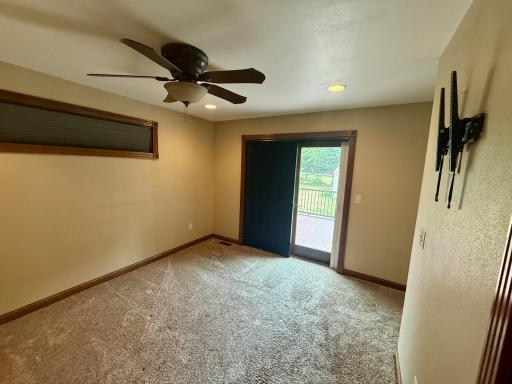 Master bedroom with patio door to porch