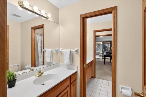 Main level full bathroom features 2 sink areas for added privacy!