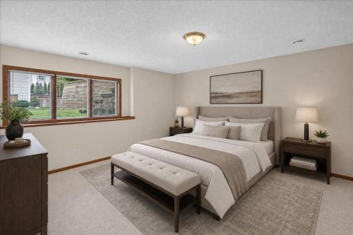 Bedroom #3 in the lower level of the home is huge! ***Image has been virtually staged***