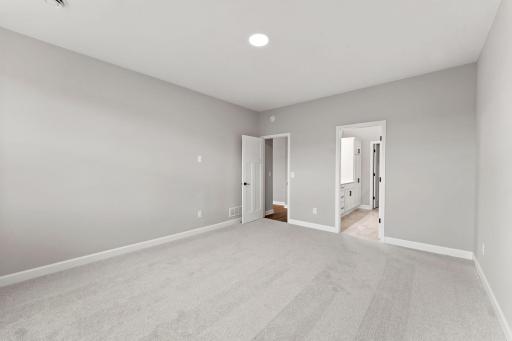 The bedroom is a comfortable retreat from the rest of the home