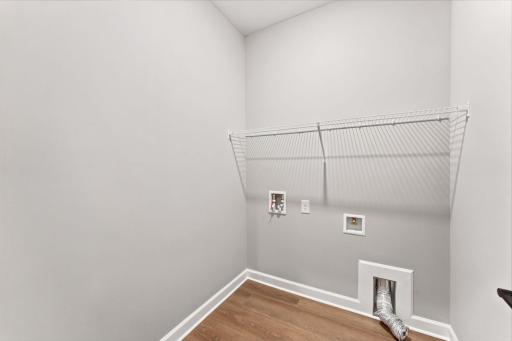 Access to the laundry room is just off the mudroom and garage, making household chores easier than ever.
