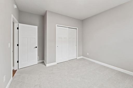 Both secondary bedrooms feature a wardrobe closet for convenient storage