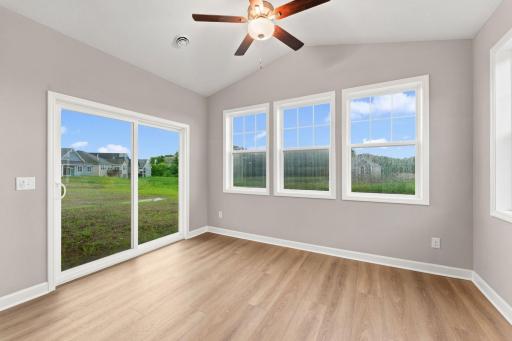 Gorgeous views from the four season porch! (Photo is of the actual home.)