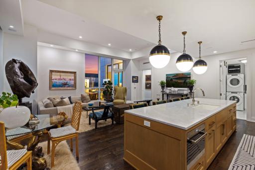 Discreetly integrated Sonos audio delivers immersive sound throughout the residence while preserving the clean, sophisticated aesthetic.
