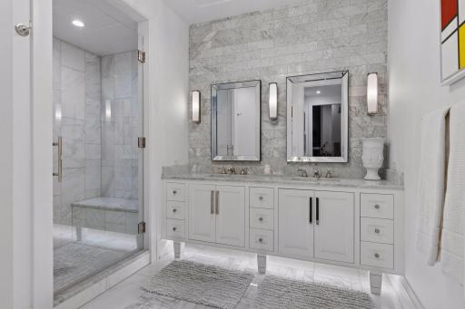 The bath was extensively upgraded with RH sconces, custom vanity lighting and a designer overhead fixture.