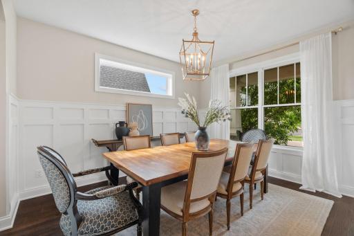 Formal dining room with custom wainscoating