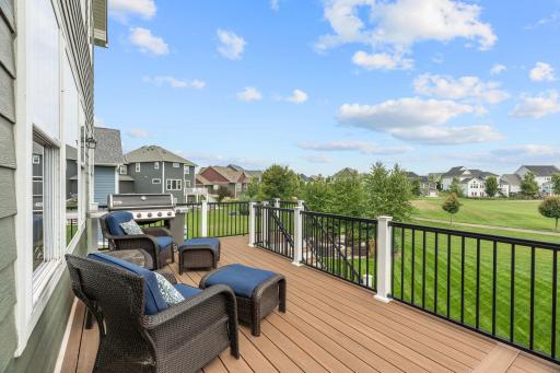 Step out onto your large composite deck with views of the green space!
