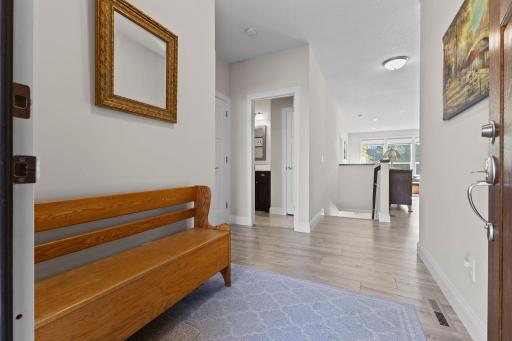 Luxury Vinyl Plank in Hallways , Living Room and Kitchen