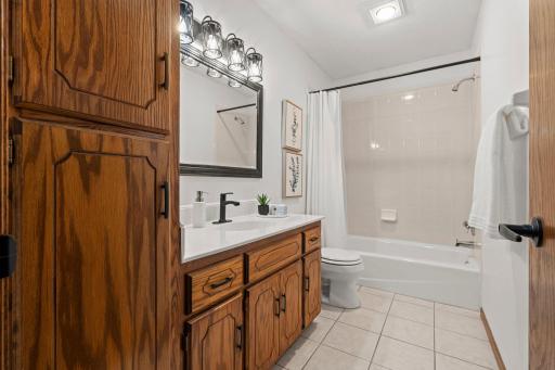 The upper level full bathroom is conveniently located off the gathering areas and close to bedrooms.