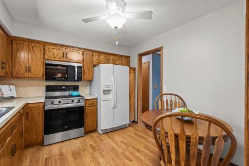 The kitchen opens to the dining area, making it easy to stay connected while cooking and entertaining.