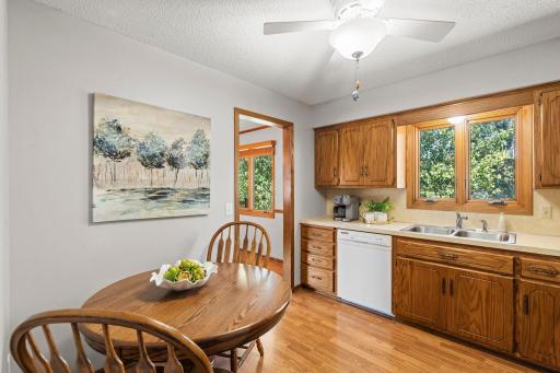 The kitchen offers plenty of workspace and storage, with a window overlooking the beautiful natural setting.