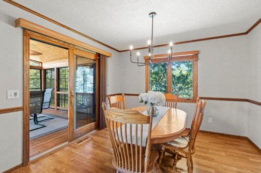 Enjoy meals surrounded by peaceful wooded views, then step directly into the three season porch for a relaxing evening.