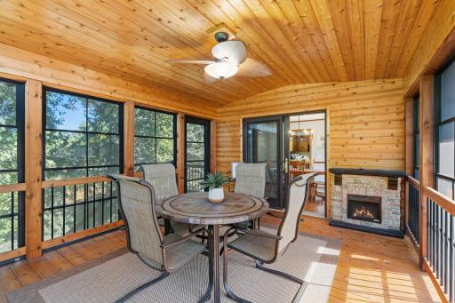 Whether enjoying morning coffee, an evening drink or time with friends, this screened porch is sure to become a favorite place to unwind.