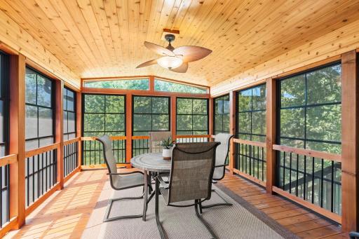 EZ Breeze windows allow you to enjoy the three season porch throughout much of the year while taking in the peaceful wooded surroundings.