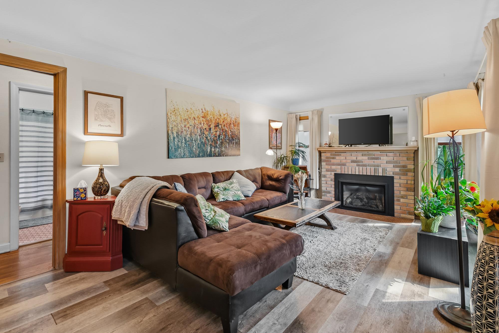 Large living room with gas fireplace