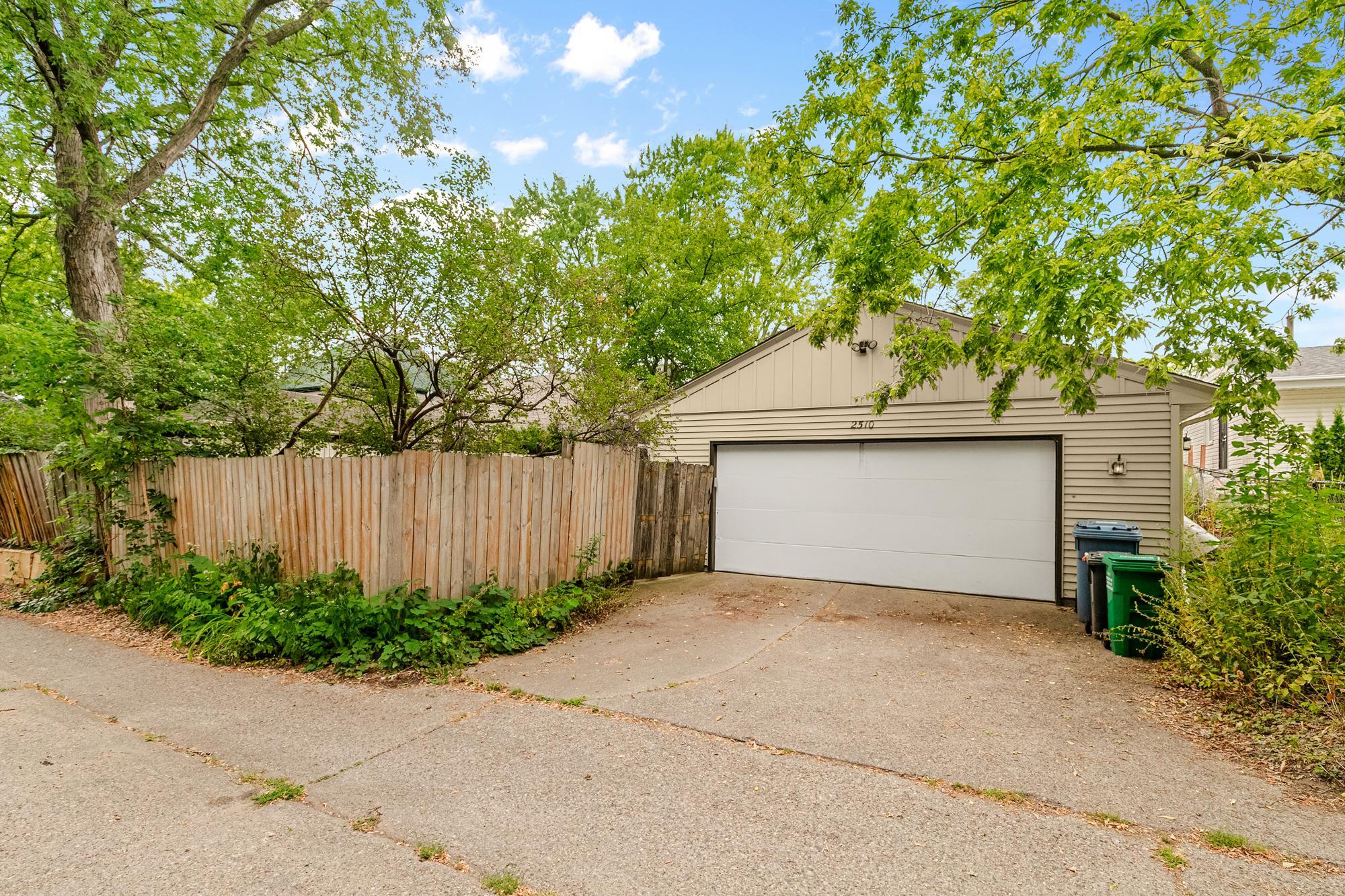 Attached garage off alleyway