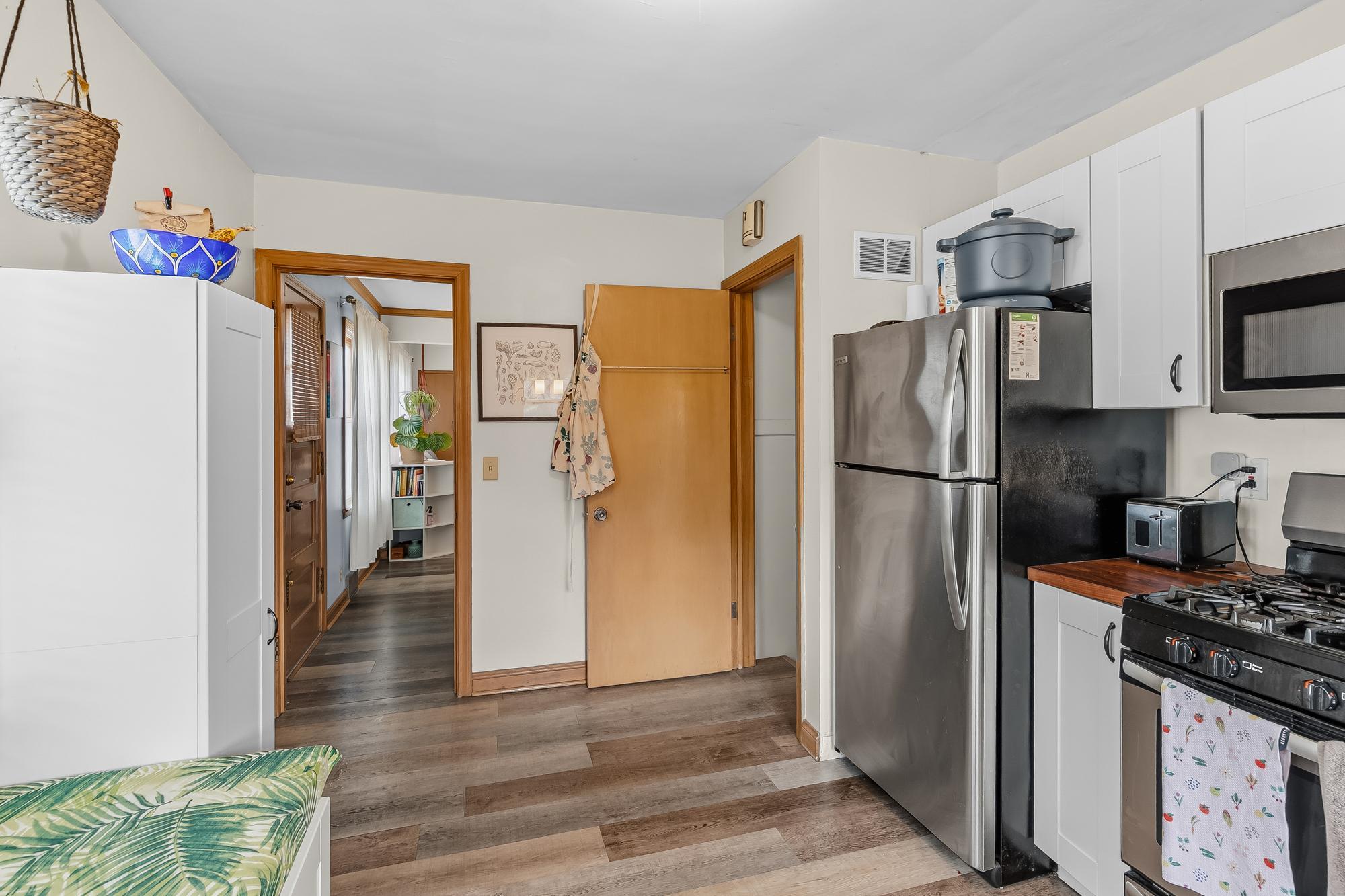 Access to Flex Room and basement off Kitchen