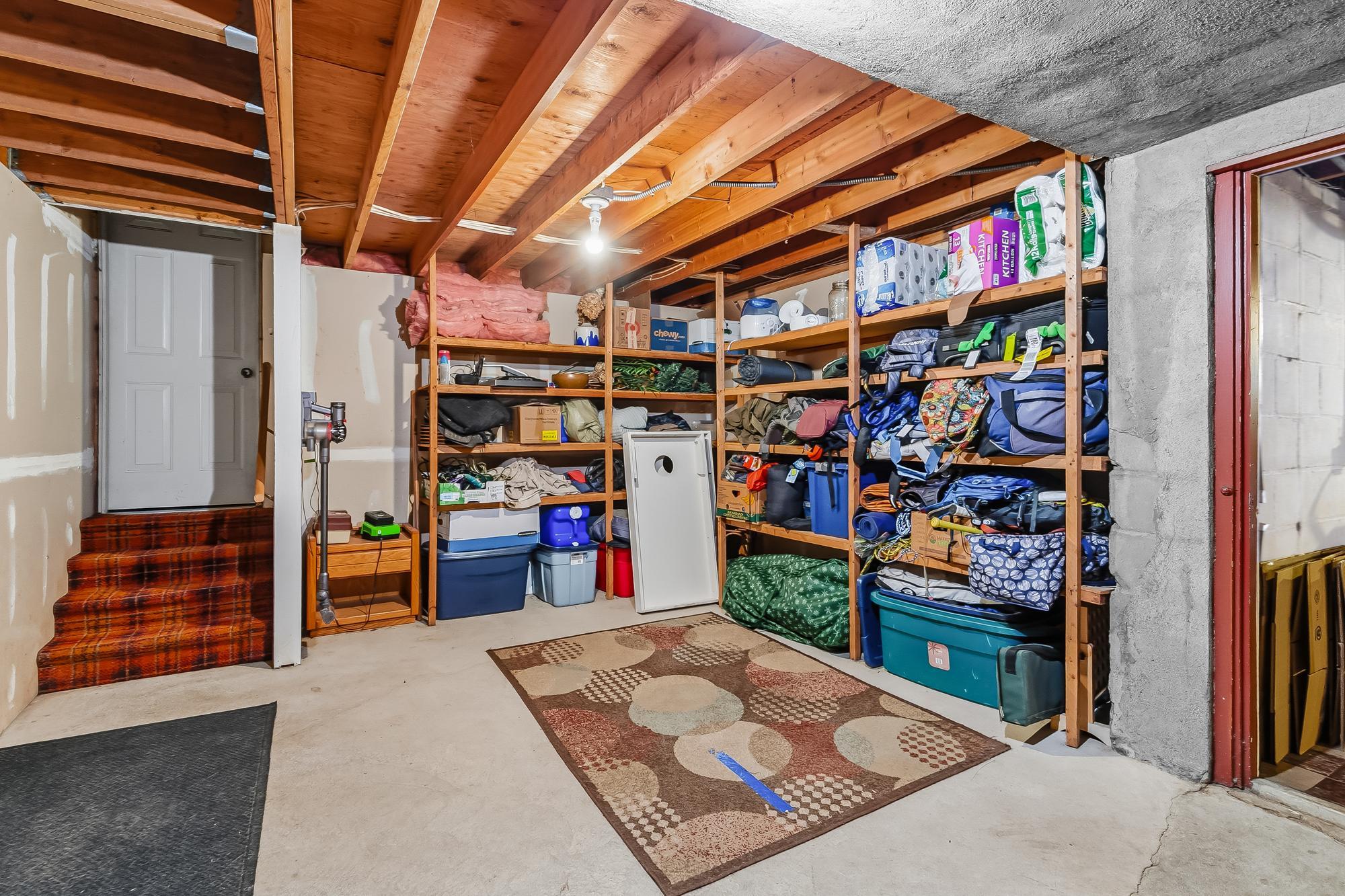Plenty of storage just inside from attached garage