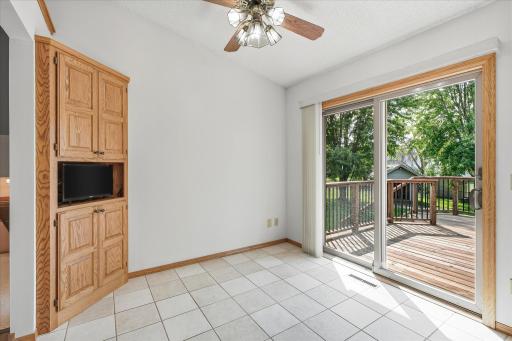 Custom built-in cabinet and shelving for convenient dinning room storage.