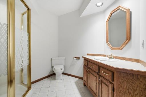 Convenient lower-level ¾ bath adds functionality to the finished walkout level and is ideally located near the family room and entertaining spaces.