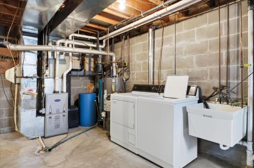 Major mechanical update includes a new furnace in 2024 with AprilAire, owned water softener and water heater replaced in 2022, providing added peace of mind for the next owner.