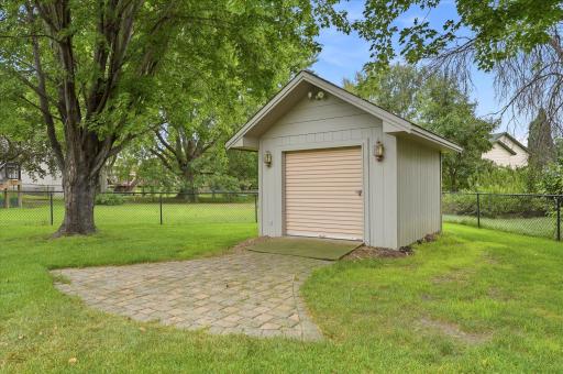 More than your average storage shed. This 12x10 bonus shed features electricity and a convenient roll-up door, making it easy to access larger lawn equipment and outdoor gear.