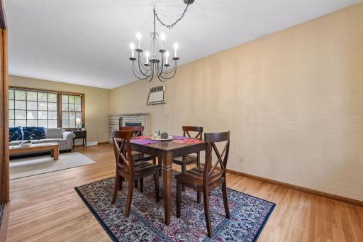 Generously sized dining area offers plenty of room for a larger table while maintaining an open connection to the living room.