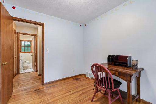 Another view of the third bedroom, with closet and convenient access to the main-level bath.