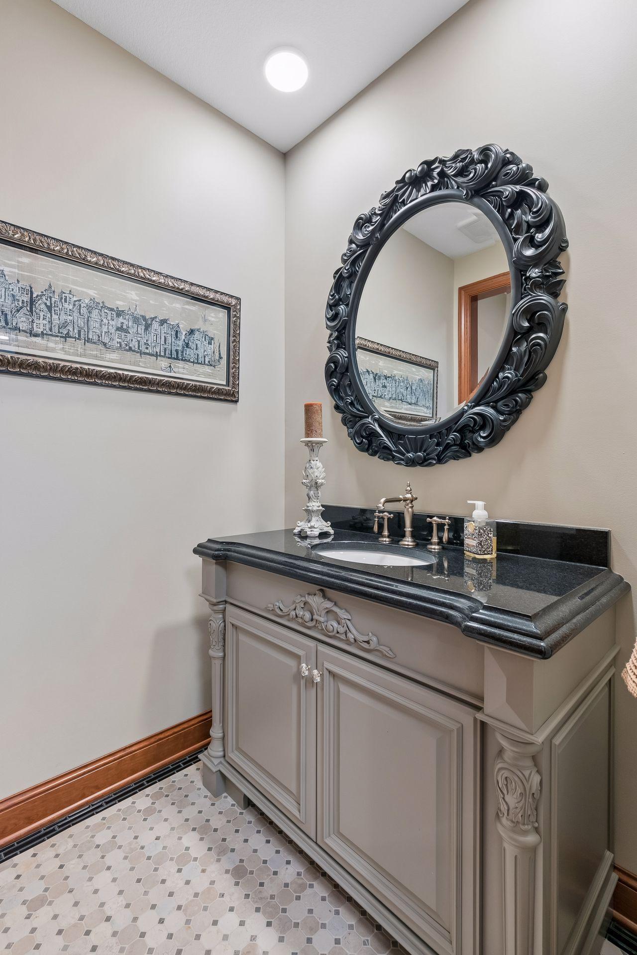 Lower level guest half bath with private toilet