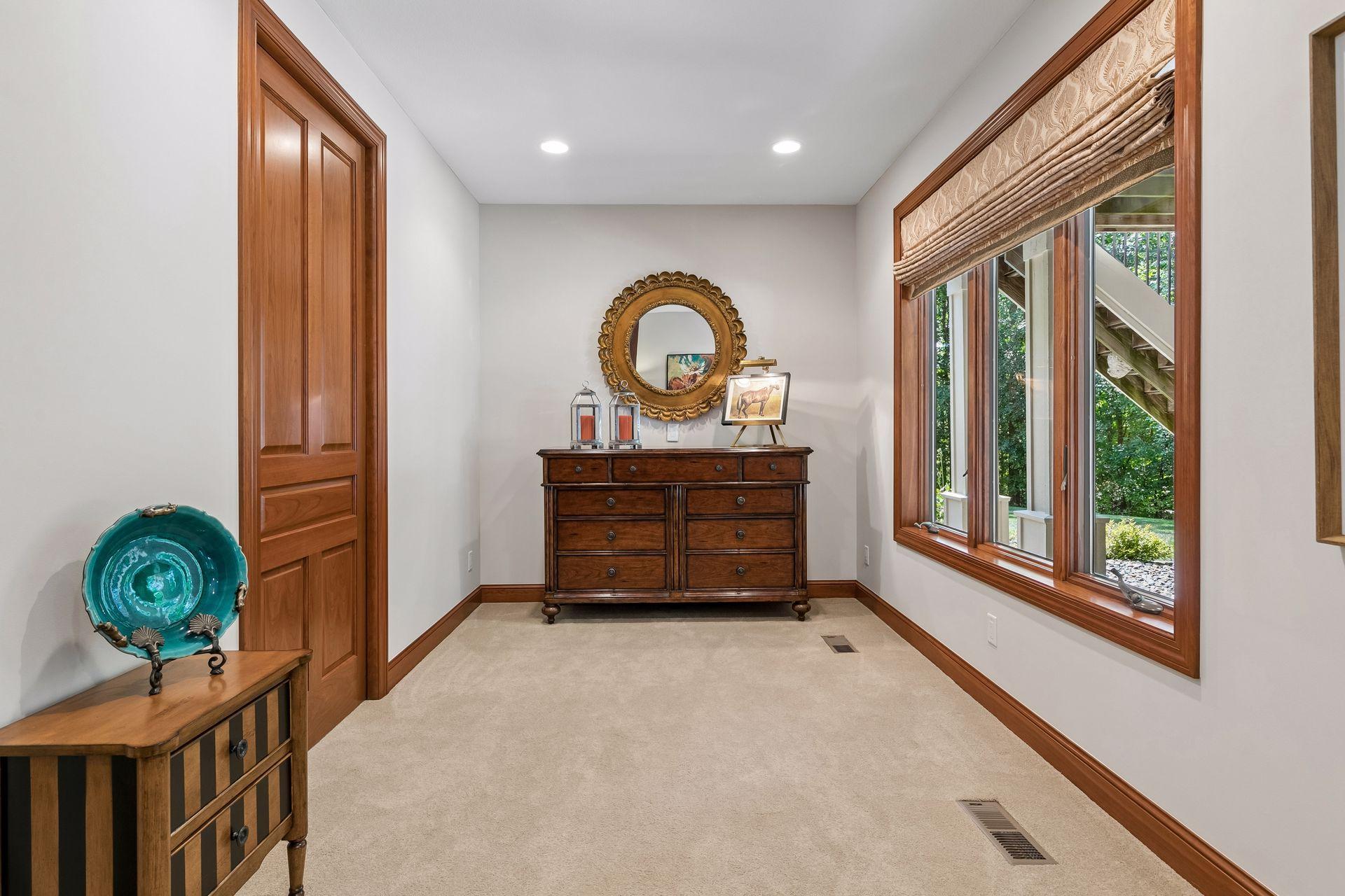 Sitting area in this bedroom along with a large walk-in closet