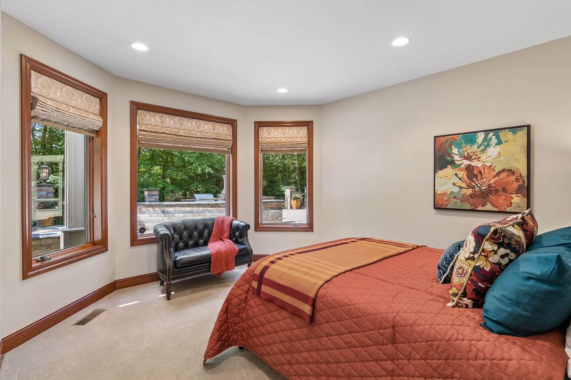 Fourth bedroom in the lower level overlooks the backyard