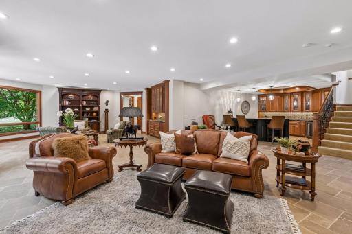 Expansive family room on lower level is an entertainer's delight