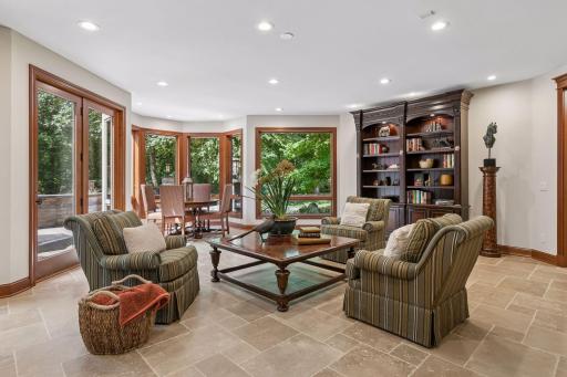 The walkout lower level features heated cut-stone flooring throughout
