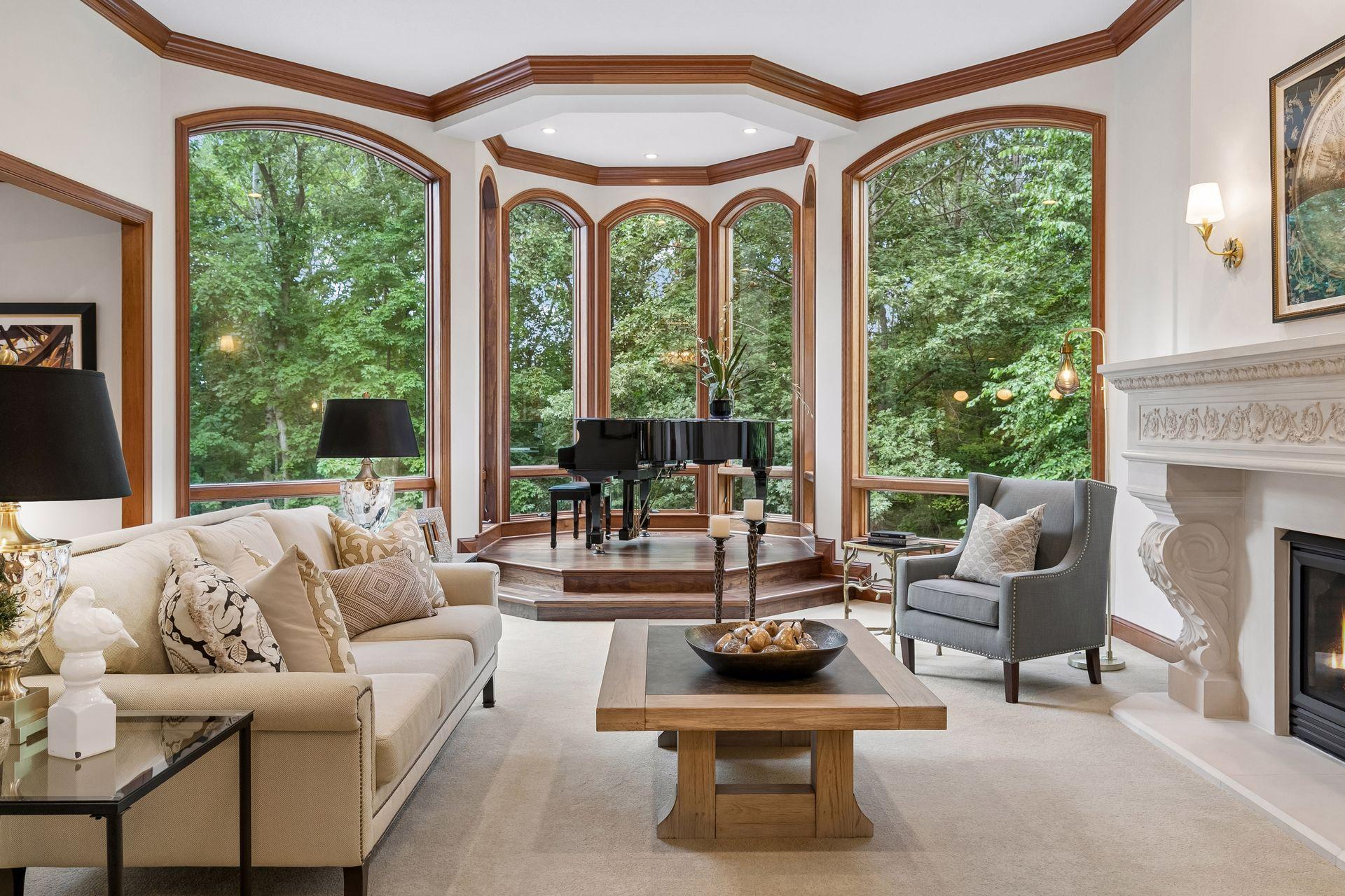 Elevated turret area framed by expansive floor to ceiling windows