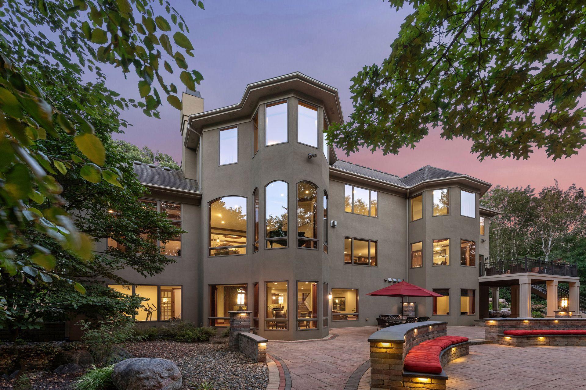 Entire back of home is filled with bountiful nature views through every window